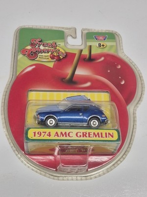 Motormax Fresh Cherries 1974 AMC Gremlin Blue 1:64 Diecast Car