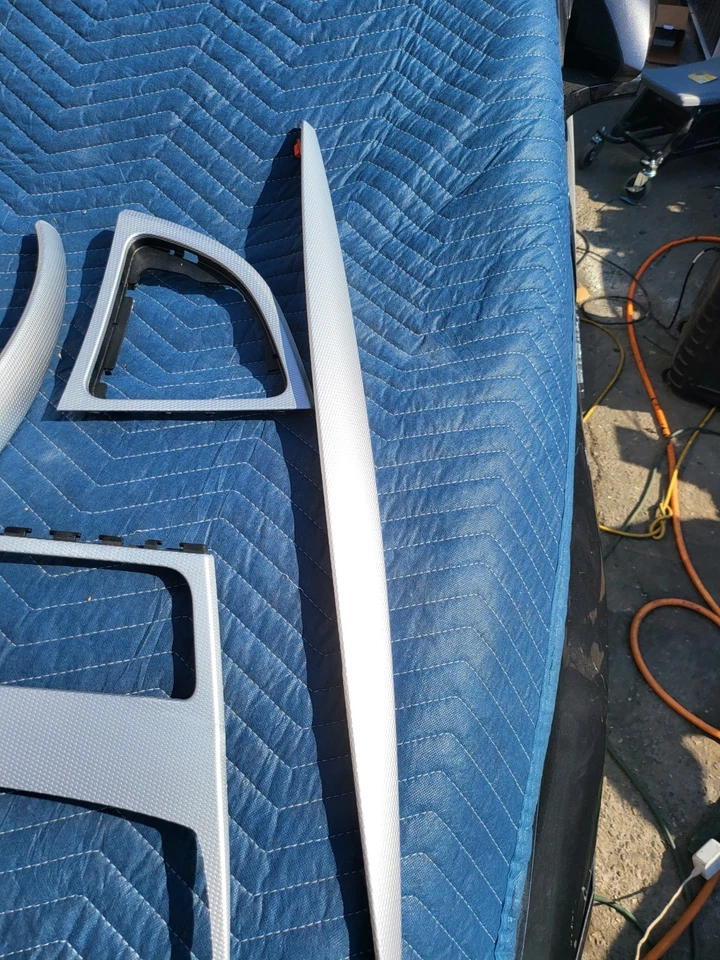 Juego de paneles de moldura de aluminio interior consola de puerta BMW OEM E88 E82 135i 128i Foto 4 de 4