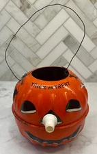 U S Metal Toy Halloween Jack O Lantern with Whistle Nose Intact