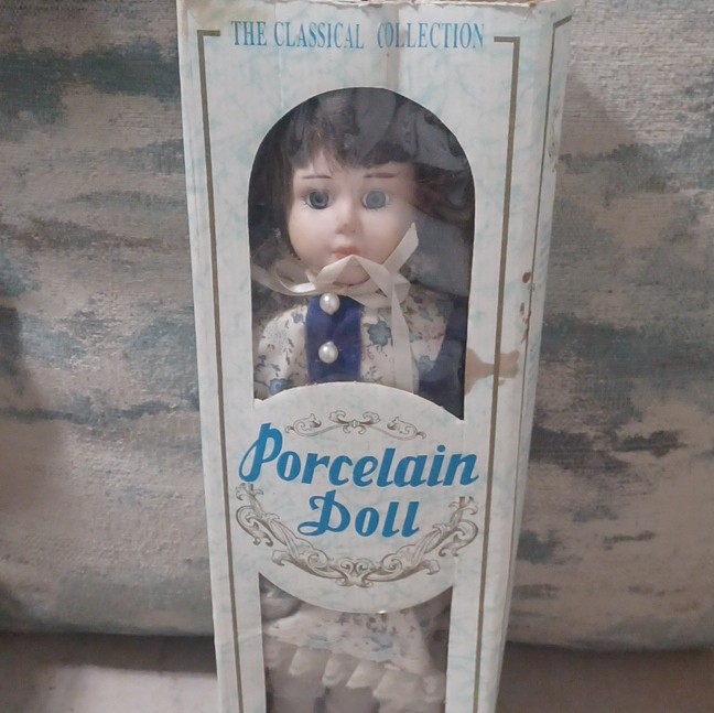 The Classical Collection Porcelain Doll Brown Curly Hair Floral Dress Bonnet