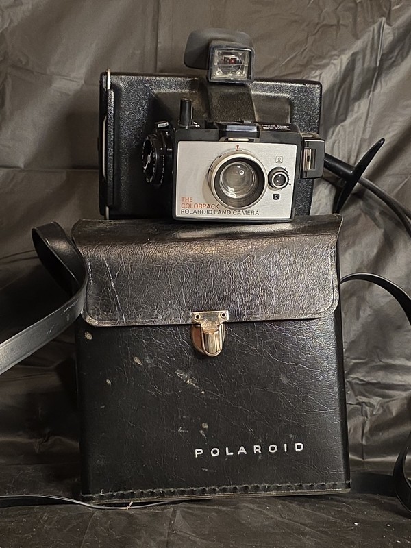 Polaroid Land Camera Vintage, Color And Black & White.