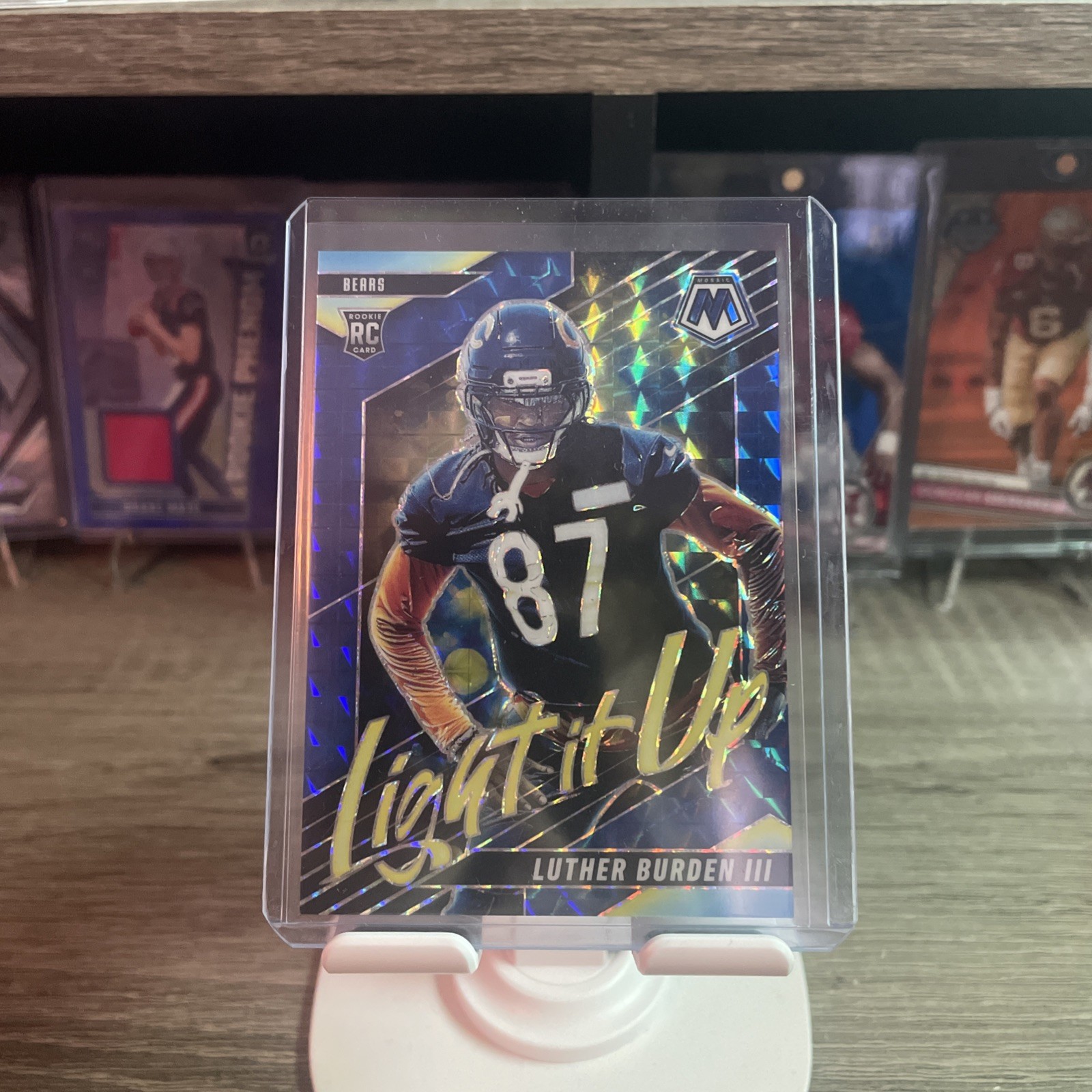 2025 Panini Mosaic - Light It Up Mosaic Luther Burden #23 Blue Prizm /99 (RC)