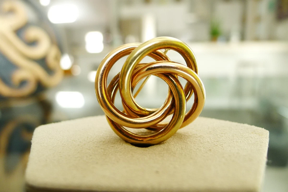Infinity brooch sale