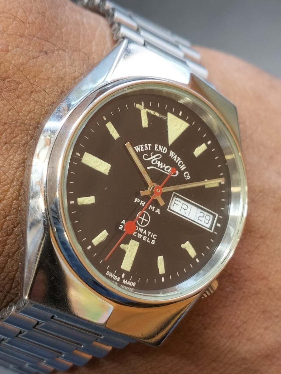 WEST END WATCH ヴィンテージ Vintage West End Watch Co Sunburst Red Dial Manual Swiss