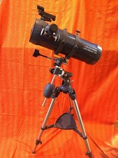 Celestron AstroMaster 114 telescope on tripod and NexYz3 Axis Smartphone adapter