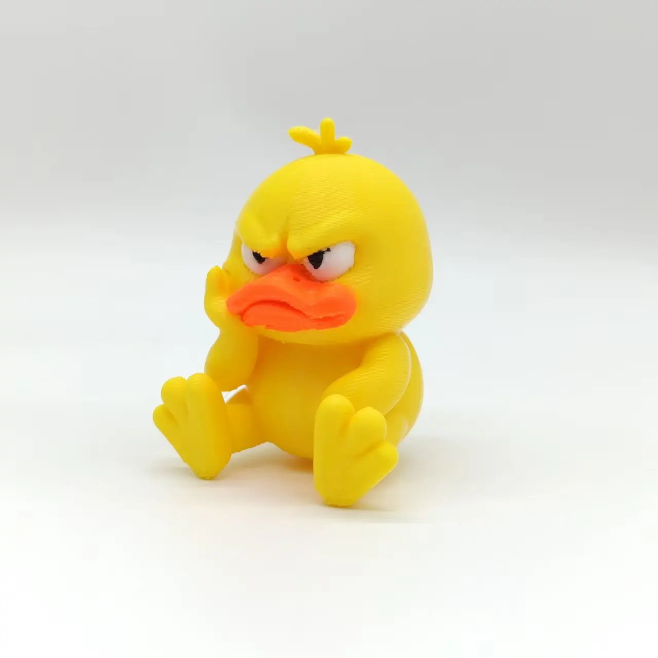 3D Printed Angry Little Yellow Duck Statue - Cute Angry Expression with Big Eyes