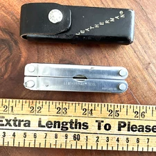 COLLECTIBLE LEATHERMAN MULTI TOOL PORTLAND, OR USA MULTI-TOOL. W/SHEATH