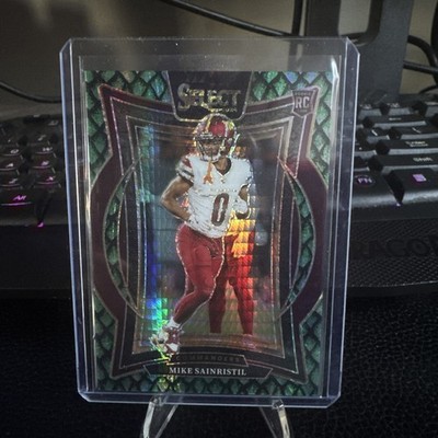 2024 Panini Select - Concourse Mike Sainristil #76 Dragon Scale Prizm 68/81 (RC)