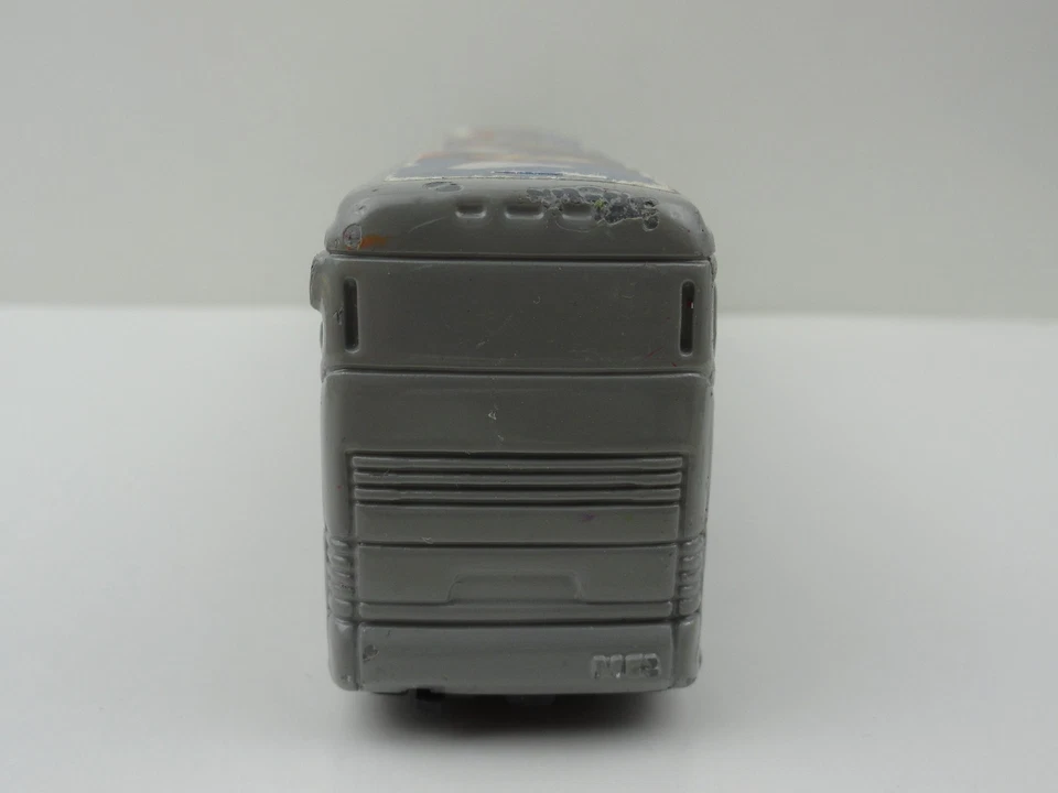 2012 Matchbox Disney Parks Motor Coach Industries Bus (Gray) w/ WEAR - Image 4 of 4