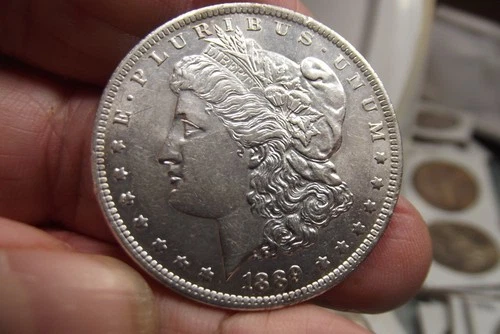 1889-O Morgan Silver Dollar High Grade AU, lightly cleaned, looks great!