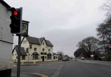 Photo 6x4 The Bull Inn ahead at the traffic lights in Bracebridge Heath  c2016