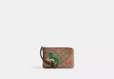 NWT NEW Coach Corner Zip Wristlet In Signature Canvas Dino Sticker Print CW856