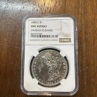 1884-O Morgan Silver Dollar New Orleans. UNC Details Harshly Cleaned NGC Slab