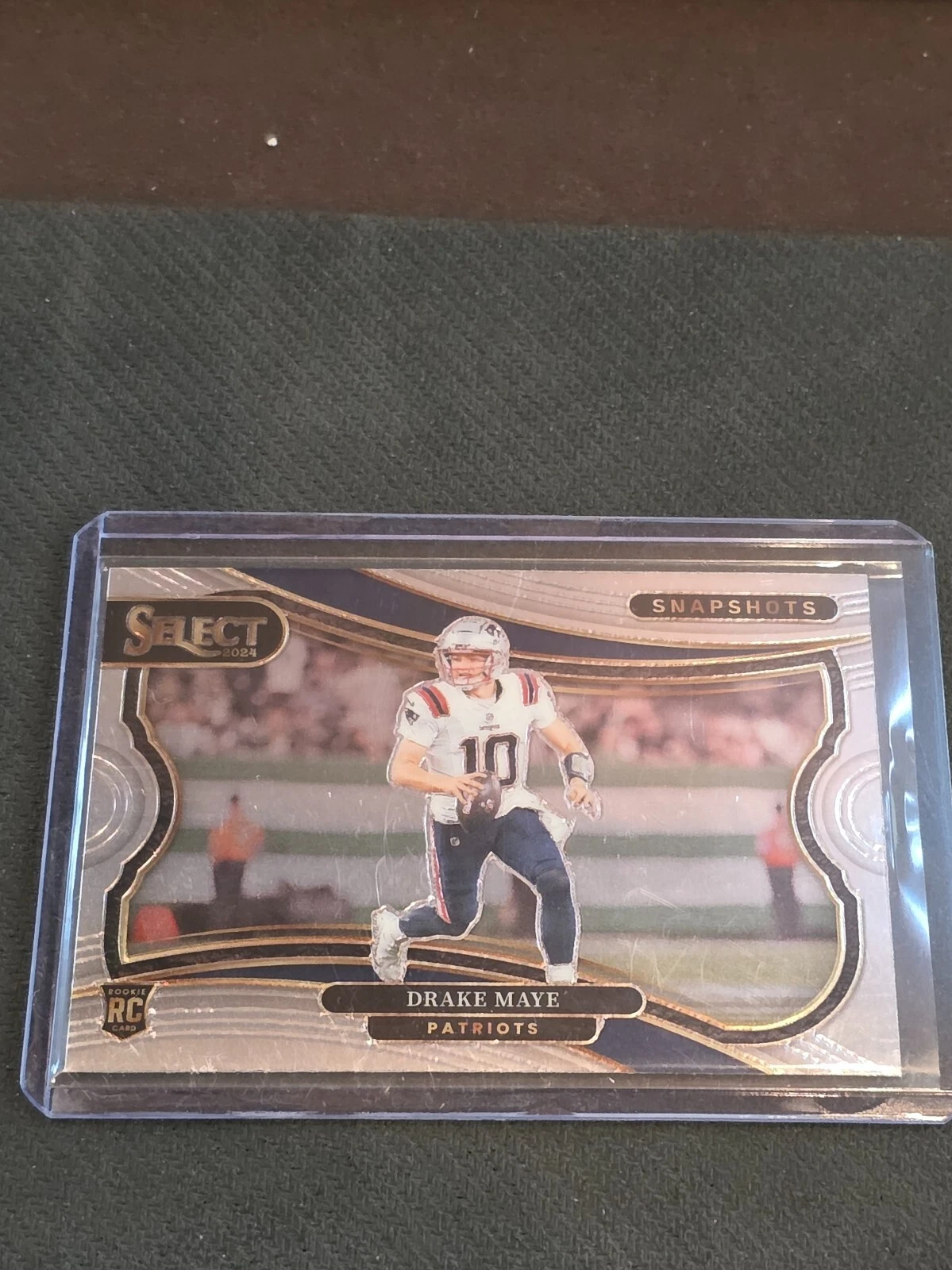 Drake Maye Panini Select Snapshots #16 Gold Prizm