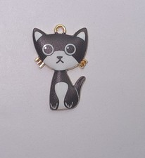 4 PIECES ENAMELED BLACK WHITE CAT CHARMS 30X20MM