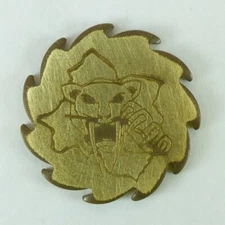 A Brass Pogs Sabretooth Slammer Buzzsaw Saw Blade Slammer from the mid 1990s
