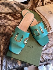Scivoli Gucci Malaga bambino con logo acqua brillante