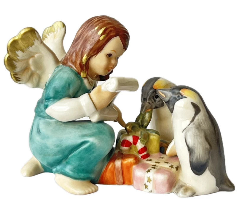 Estatuilla de porcelana Goebel vintage querubín ángel con pingüinos lee... - Imagen 1 de 4