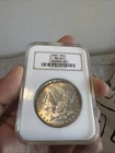 1887 $1 Morgan Silver Dollar MS64 NGC Toned Toning
