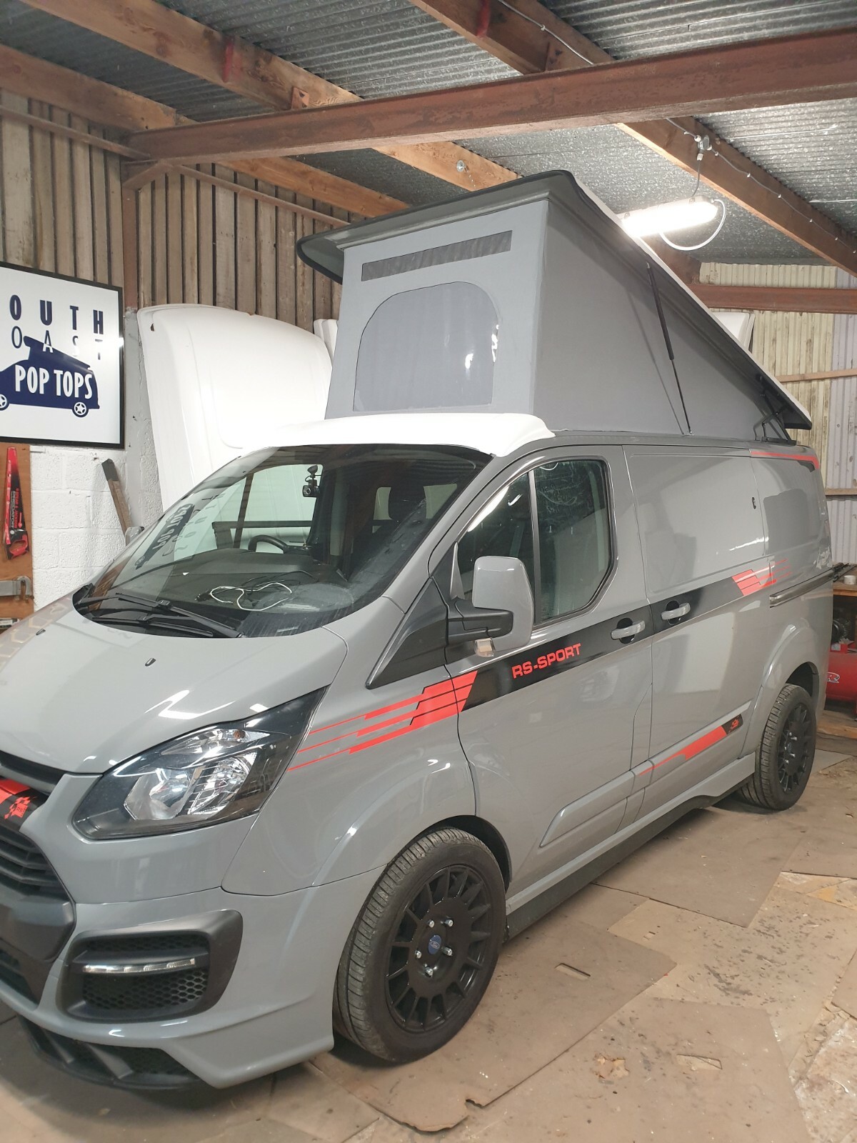 transit custom pop top fitting