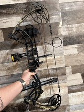 Bear Cruzer G4 Right Handed Compound Bow In Black With Camo Limbs Fully Loaded