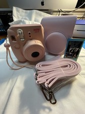 Instax mini 8 with case, album, and film