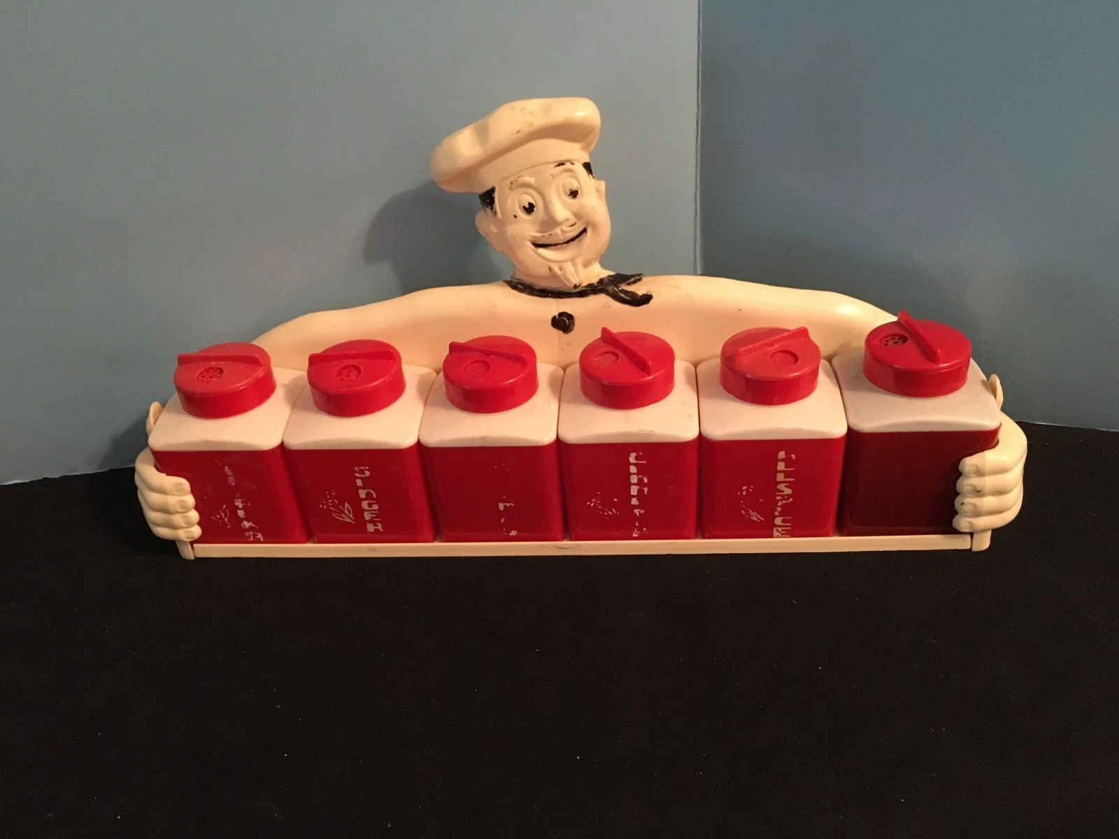 VINTAGE SPICE RACK W/ RED & WHITE JARS & JOLLY CHEF