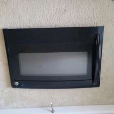 GE Microwave Oven Original Door Assembly with Handle & 2 Locking Latch hooks.