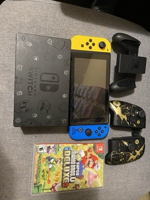 Nintendo Switch Console with Dock, Controllers, Super Mario Bros U Deluxe, Pika 
