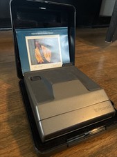 Polaroid Spectra System Instant Film Camera with Case and Booklet