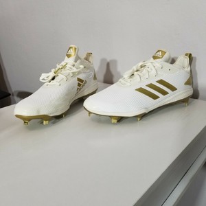 white and gold cleats baseball