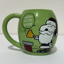 2016 Peanuts Snoopy Coffee Mug Green Santa Woodstock Ringing Bell HO HO HO  24oz