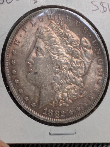 1882-O Morgan Dollar AU With Color Rainbow Red