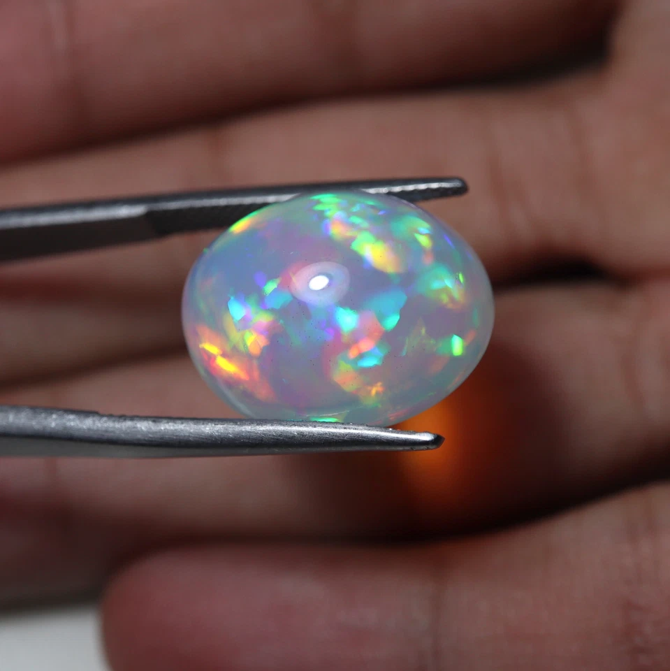 15.4 Cts 19.3x15.6 MM Natural AAA+ Green Red Yellow Fire Ethiopian Opal Oval Cab - Image 2 of 4