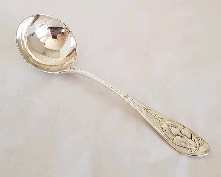 Antique sterling silver sauce ladle. London 1903. By Goldsmiths & Silversmiths