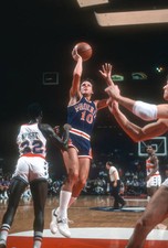 Don Buse Phoenix Suns shoots over Larry Wright Washington Bullets - Old Photo