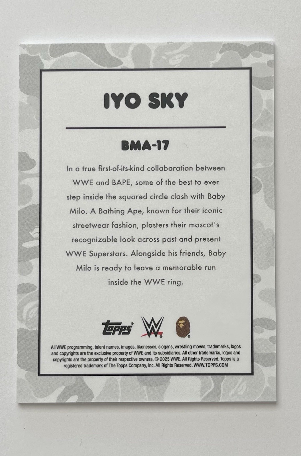 2025 Topps WWE x BAPE #BMA-17 IYO SKY BABY MILO WHITE FOIL CAMO #/50 thumbnail 2
