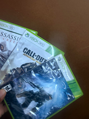 Microsoft Xbox 360 3-Game Lot: Assassin's Creed, COD AW, Halo 4