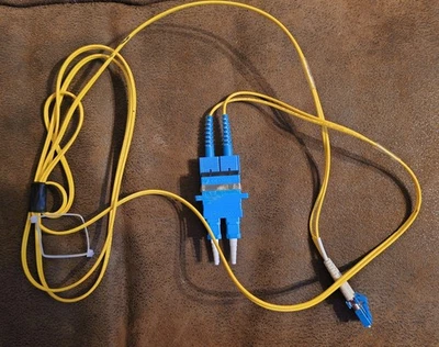 Corning fiber optic patch cable, specifically an LC/APC to SC/UPC duplex cable - Image 1 of 4