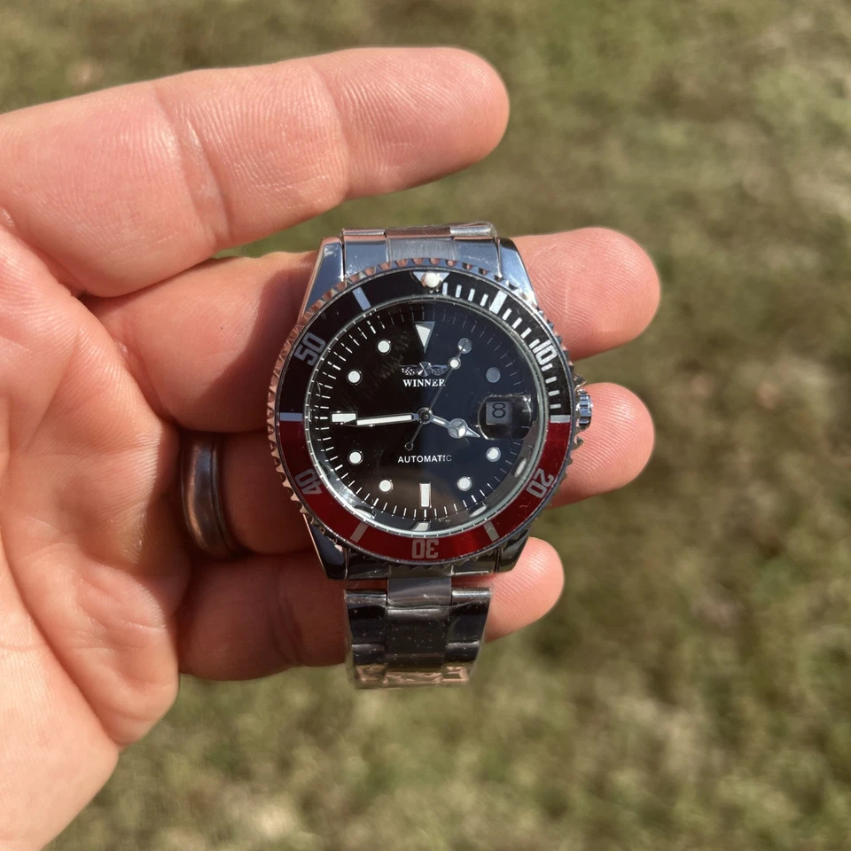 Reloj mecánico automático Winner de acero inoxidable para hombre - Bisel de Coca-Cola impermeable Foto 4 de 4