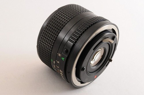【CASI COMO NUEVO+】CANON NEW FD NFD 24mm F/2.8 MF Lens Cap + 1984 OLYMPIC... - Imagen 6 de 12