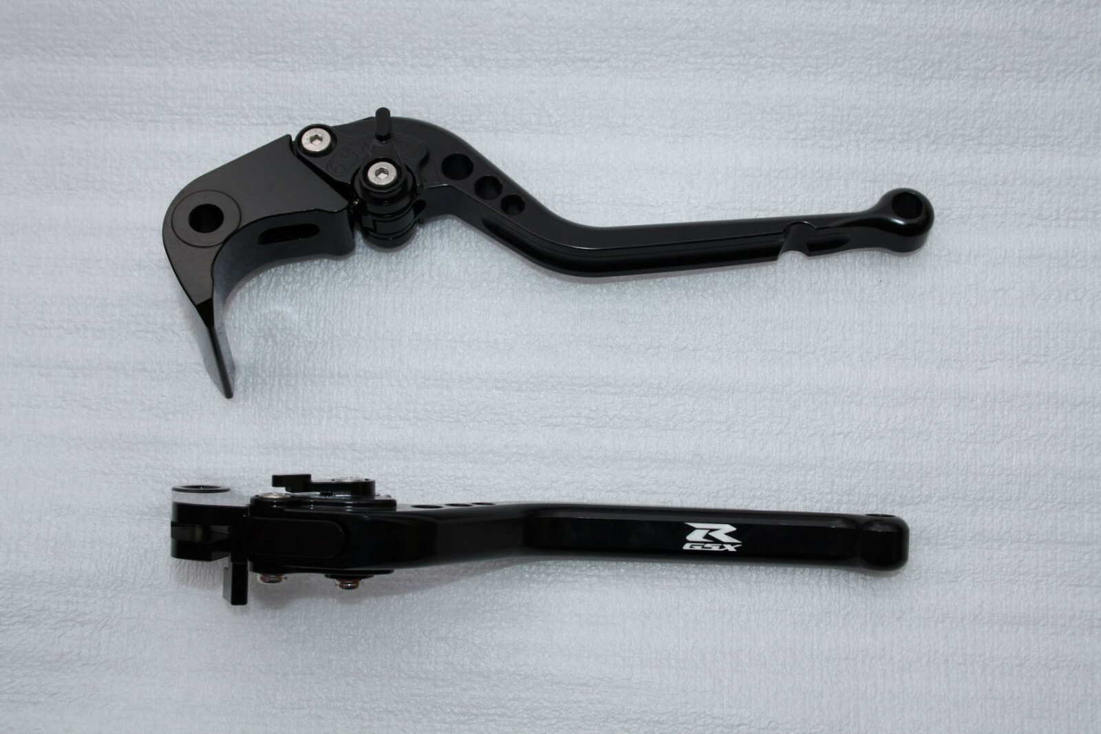 Leviers Suzuki GSXR 1000 2007 noir pour remplacer les commandes de frein usées