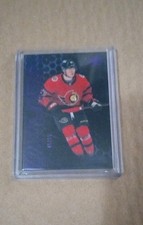 2020-21 SPx - Ud Black Obsidian Rookies Tim Stutzle #OR-50 Purple /99 (RC)