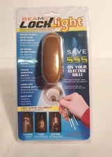 HTF BEAMii LOCK LIGHT GOLD Touch Activated Energy Saving Paintable NEW PACKAGE
