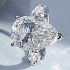 5.24 TCW Pear Cut Moissanite Three Stone Engagement Ring 14k White Gold Plated