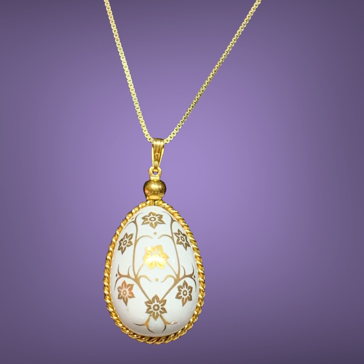VINTAGE 1978 bisque porcelain egg pendant necklace from the