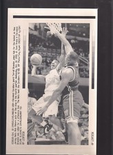 Terrell Brandon vs Rick Mahorn Vintage A/P Laser Wire Photo with caption