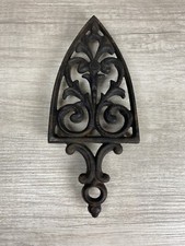Vintage Cast Iron Sad Iron Trivet Bellflowers Ornate Footed Hanger Hole Handle