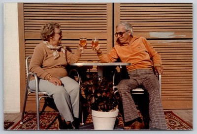 Vintage Photo Couple Clinking Glasses Together on European Patio 1980s