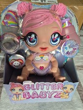 Glitter Babyz Doll Series 2- Dreamia Stardust (Pink/Rainbow) with accessories.